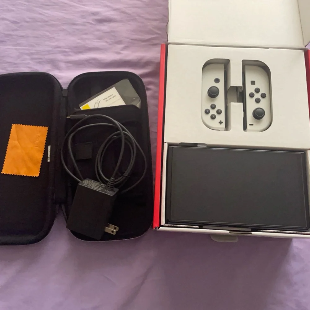 Nintendo Switch with Gray Joy-Con and Accessories